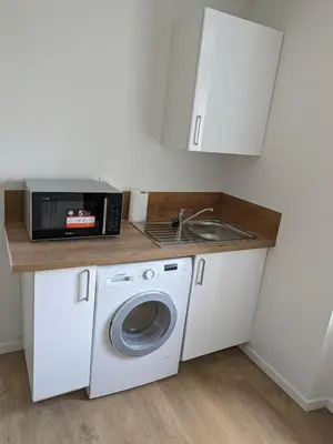 Cuisine ou kitchenette dans l'établissement La planque du 1er