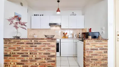Cuisine ou kitchenette dans l'établissement L'Escapade Colmarienne