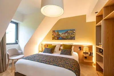 Un ou plusieurs lits dans un hébergement de l'établissement Hôtel Terra Vinum