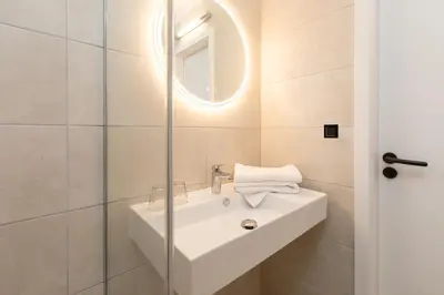 Salle de bains dans l'établissement Hôtel Terra Vinum
