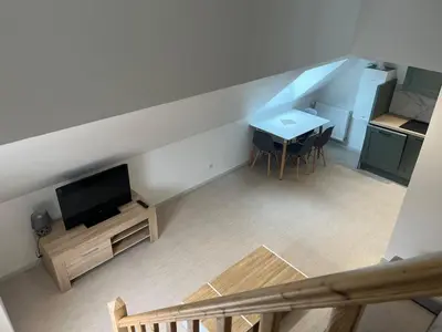 Télévision ou salle de divertissement dans l'établissement Appartement T3 Duplex centre ville