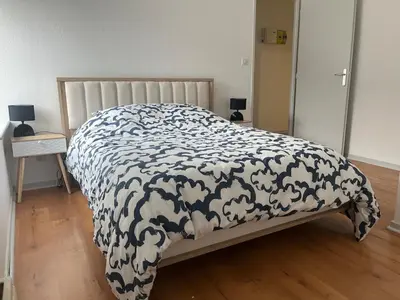 Un ou plusieurs lits dans un hébergement de l'établissement Appartement T3 Duplex centre ville
