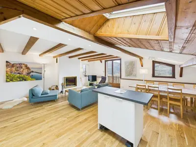 Coin salon dans l'établissement Appartement Terrasse, vue sur les montagnes et Parking
