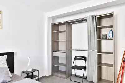 Un ou plusieurs lits dans un hébergement de l'établissement le refuge fleuri T5 avec terrasse et jardin