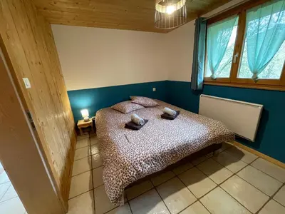 Un ou plusieurs lits dans un hébergement de l'établissement Chalet de montagne à La Bresse, proche des pistes de ski et des lacs