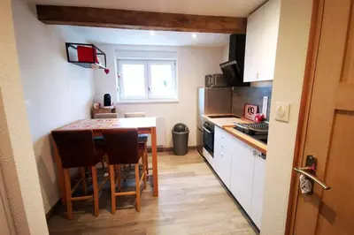 Cuisine ou kitchenette dans l'établissement Joli meublé calme et proche commodités