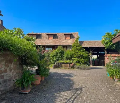 Jardin de l'établissement La Poulie - Apartment with Balcony and Free Privative Parking - Close to Colmar