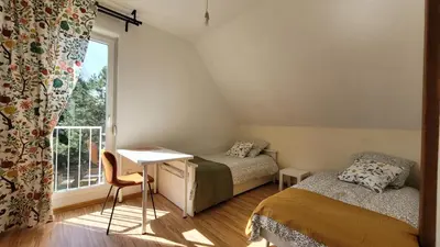 Un ou plusieurs lits dans un hébergement de l'établissement La petite maison du Florival