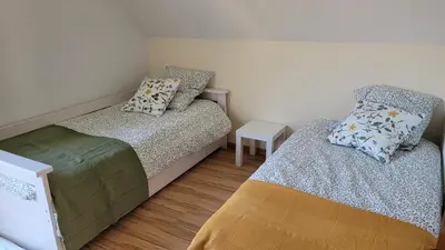 Un ou plusieurs lits dans un hébergement de l'établissement La petite maison du Florival