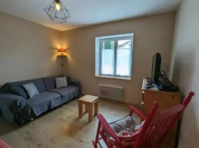 Coin salon dans l'établissement Charmante maison à Xonrupt-Longemer, 80 m² avec jardin