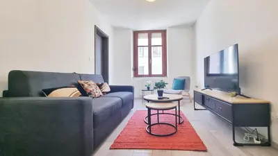 Coin salon dans l'établissement Chez Le General - Charmant T2