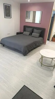 Coin salon dans l'établissement Grand studio dans maison parking privé gratuit