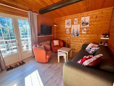 Coin salon dans l'établissement Le cocon de La Bresse