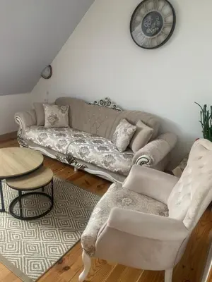 Coin salon dans l'établissement Gîte rose
