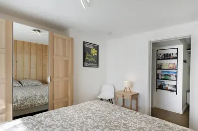 Un ou plusieurs lits dans un hébergement de l'établissement Le Manalac votre Appartement 4-6P au centre ville