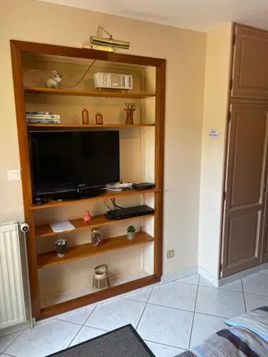 Télévision ou salle de divertissement dans l'établissement La Chambre d'hôte
