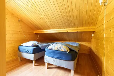 Coin salon dans l'établissement Chalet Le Bas du Paradis