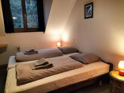 Un ou plusieurs lits dans un hébergement de l'établissement Gite les Baudy - group for 20 people