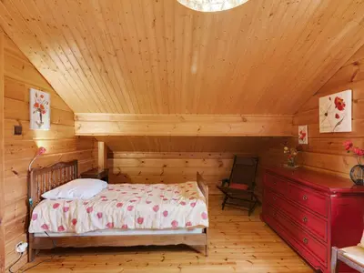 Un ou plusieurs lits dans un hébergement de l'établissement Nature Chalet in Abbévillers