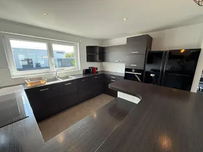 Cuisine ou kitchenette dans l'établissement Appartement attique