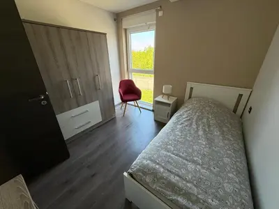 Un ou plusieurs lits dans un hébergement de l'établissement Appartement attique