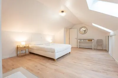 Un ou plusieurs lits dans un hébergement de l'établissement Le Maçon Park 2e Étage Duplex 6 Pers