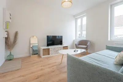 Télévision ou salle de divertissement dans l'établissement Le Maçon Park 2e Étage Duplex 6 Pers