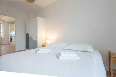 Un ou plusieurs lits dans un hébergement de l'établissement Le Maçon Park 2e Étage Duplex 6 Pers