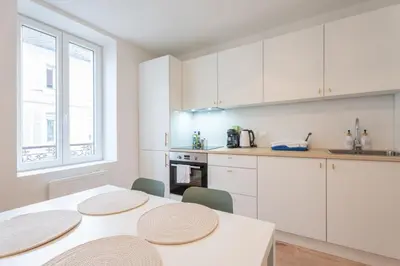 Cuisine ou kitchenette dans l'établissement Le Maçon Park 1er Étage Appartement 4 Pers