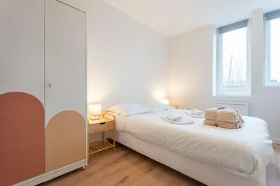 Un ou plusieurs lits dans un hébergement de l'établissement Le Maçon Park 1er Étage Appartement 4 Pers