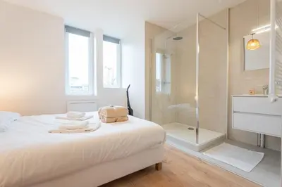 Un ou plusieurs lits dans un hébergement de l'établissement Le Maçon Park 1er Étage Appartement 4 Pers