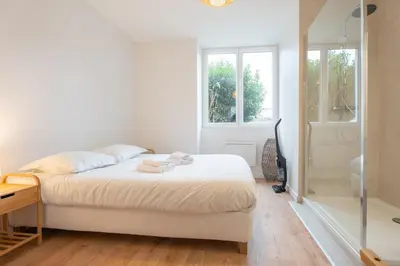 Un ou plusieurs lits dans un hébergement de l'établissement Le Maçon Park RDC Appartement 2 Pers Mulhouse