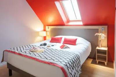 Un ou plusieurs lits dans un hébergement de l'établissement Résidence Pierre & Vacances La Petite Venise