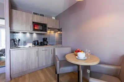 Cuisine ou kitchenette dans l'établissement Résidence Pierre & Vacances La Petite Venise