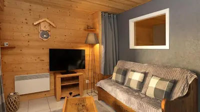 Télévision ou salle de divertissement dans l'établissement La Belle Vue Gérardmer