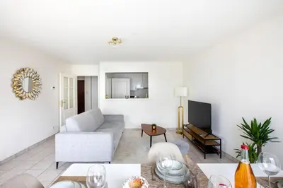 Coin salon dans l'établissement Appartement lumineux 3 frontières parking gratuit