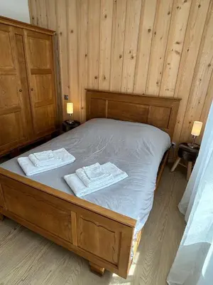 Un ou plusieurs lits dans un hébergement de l'établissement La Jonquille, Appartement Centre Ville de Gérardmer, linge et ménage inclus