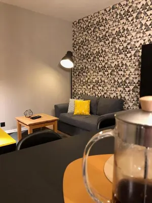 Coin salon dans l'établissement Gîte Eau-Vive, à 15kms de Colmar
