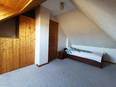 Un ou plusieurs lits dans un hébergement de l'établissement Gîte les chateaux