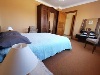 Un ou plusieurs lits dans un hébergement de l'établissement Gîte les chateaux
