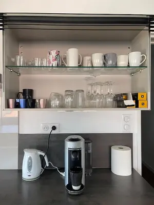 Cuisine ou kitchenette dans l'établissement Appartement spacieux et son rooftop