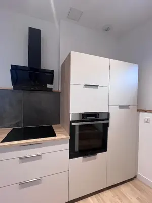Cuisine ou kitchenette dans l'établissement Charme et confort au cœur des remparts - duplex