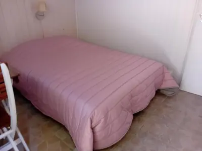 Un ou plusieurs lits dans un hébergement de l'établissement chambre studio