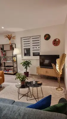 Coin salon dans l'établissement L'atelier - logement neuf 3 étoiles sur la route des vins d'Alsace