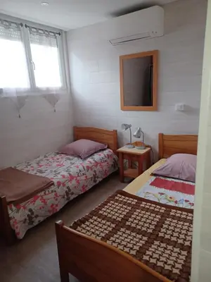 Un ou plusieurs lits dans un hébergement de l'établissement Loft touristique 3 étoiles