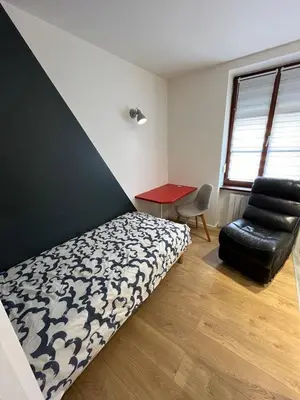 Coin salon dans l'établissement Superbe appartement atypique au cœur de Mulhouse