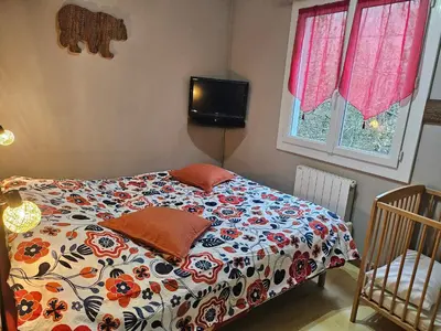 Un ou plusieurs lits dans un hébergement de l'établissement Chez Corinne