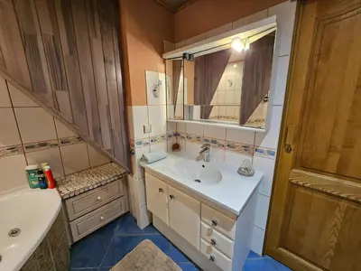Salle de bains dans l'établissement Chez Corinne