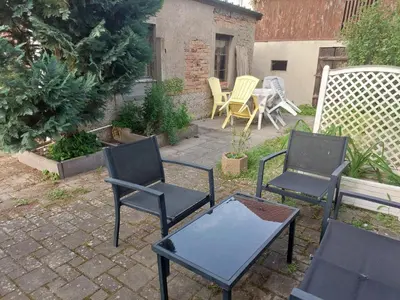 Jardin de l'établissement Maison spacieuse à Sainte-Croix-en-Plaine avec jardin