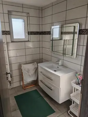 Salle de bains dans l'établissement Appartement proche Aéroport